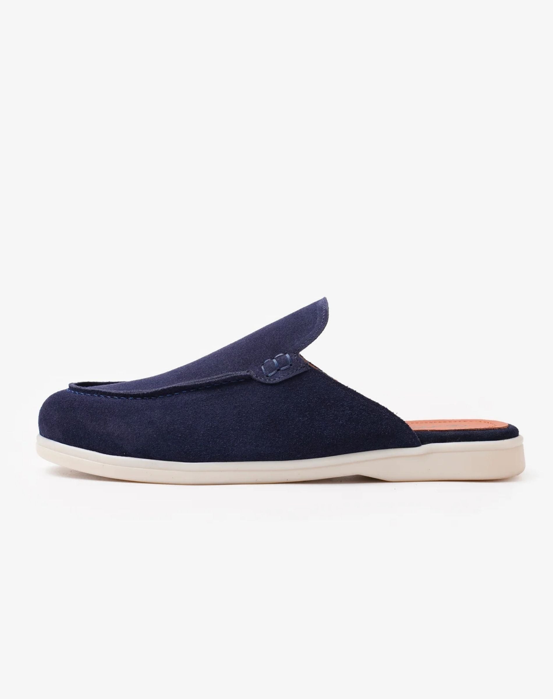 Navy blue slipper with a white sole on a light gray background